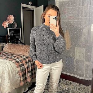 3. Black and white knit mock turtleneck sweater with bubble sleeves